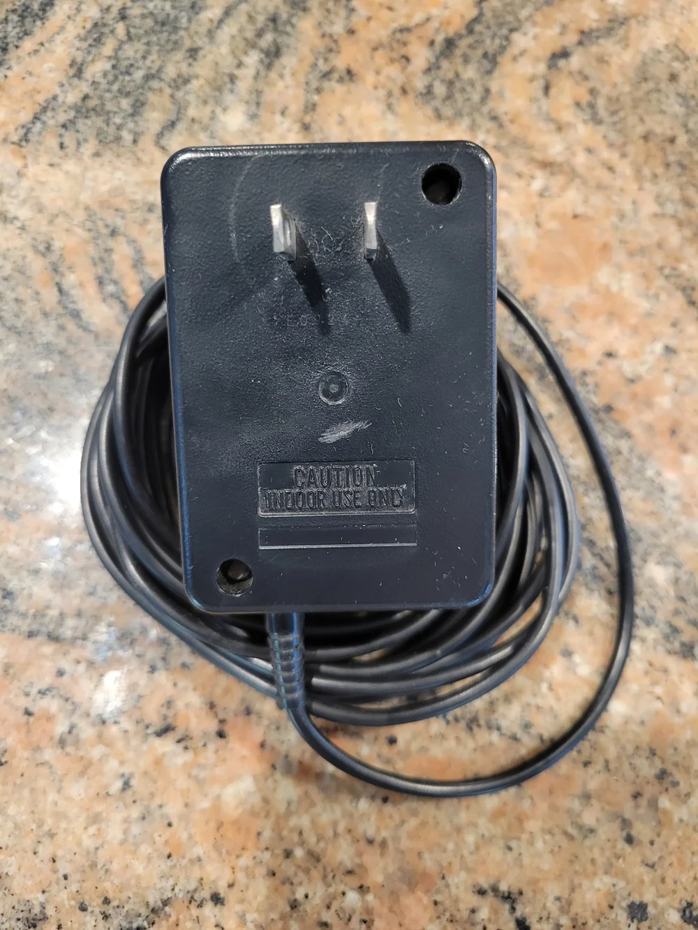 Official Nintendo AC Adapter. Black plastic exterior. Standard Power Cord. $13